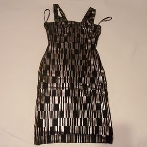 Herve leger black and gold